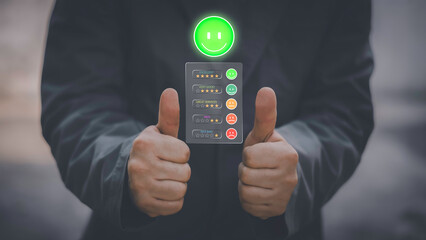 Businessman using smartphone to give five-star rating and positive feedback through virtual interface. Concept of customer satisfaction, user experience, review system, and digital feedback.