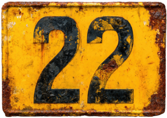 Worn, yellow plate with large black number '22', weathered and rusty