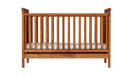 Wooden crib with slats and white mattress, centered on a dark background