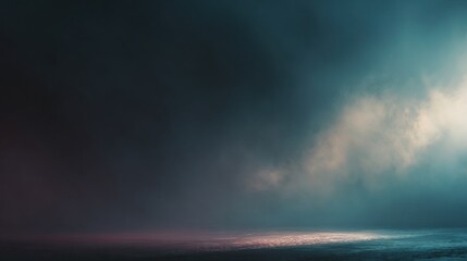 Obraz premium A serene, misty landscape with a gradient of dark to lighter hues reflecting on a calm water surface.