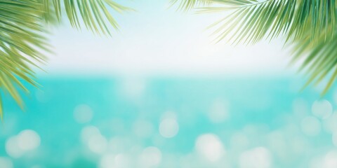 Obraz premium A serene coastal scene with palm leaves framing a soft, blurred ocean background in shades of turquoise and light blue.