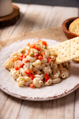 Pasta Tuna salad with elbow pasta and canned tuna, served with saltine crackers. Easy and healthy recipe.