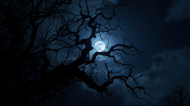 A dark, cinematic night scene features a full moon behind drifting clouds, with twisted, leafless tree branches in sharp silhouette. The deep blue sky, misty fog, and soft moonlight rays create an eer