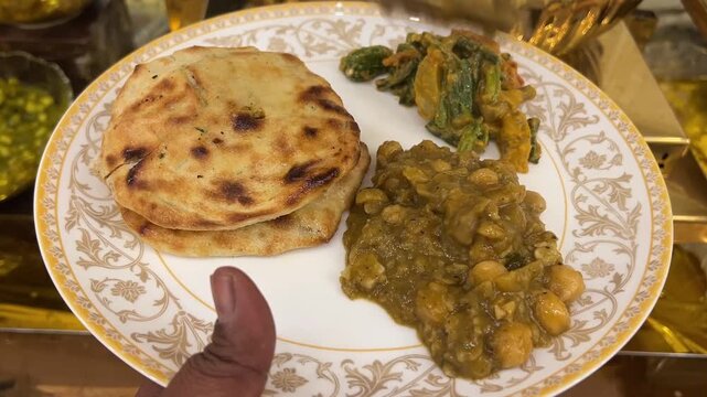 Tandoori Roti and Channa masala served in an Indian wedding