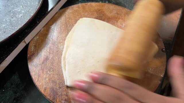 Bihar-style triangle Paratha being prepared at home in India