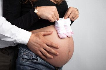 Pregnant woman big belly final weeks of pregnancy gender reveal