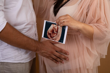 Pregnant woman big belly final weeks of pregnancy gender reveal