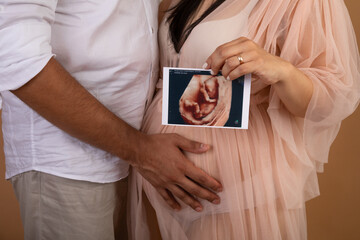 Pregnant woman big belly final weeks of pregnancy gender reveal