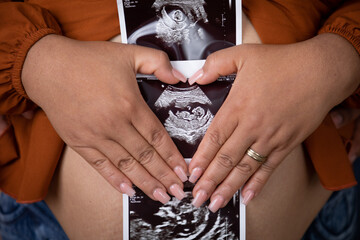 Pregnant woman big belly final weeks of pregnancy gender reveal