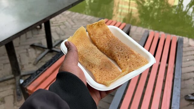 Patishapta is a traditional Bengali sweet crepe or pancake