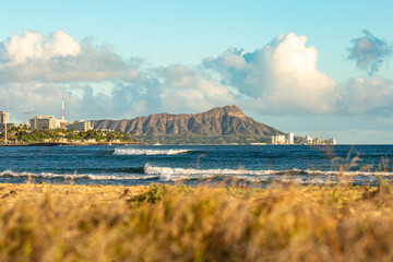 Golden Hour Sunset over Waikiki Beach and Diamond Head in Honolulu.
