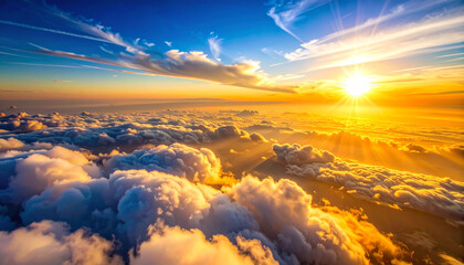 Majestic Sunrise Over Cloudscape: Golden Light, Sunbeams, and Serene Sky Above the Horizon.