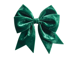Emerald velvet bow, isolated on black background, showcasing texture and folds