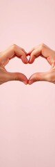 Two hands forming a heart shape against a soft background, conveying love and tenderness,  connection,  care expression