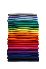 Stacked colorful shirts, arranged in rainbow order, on dark backdrop