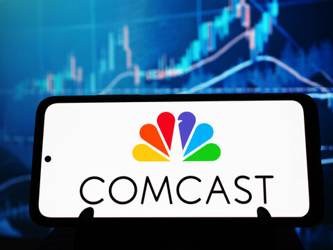 In this photo illustration,  Comcast Corporation logo seen displayed on a smartphone.