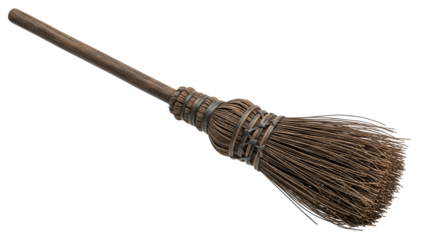 Old wooden broom with straw bristles on black background 1