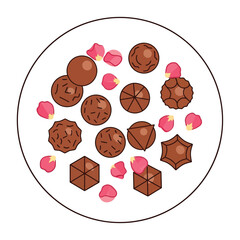 Assortment of gourmet chocolate truffles with delicate pink rose petals on a white plate.