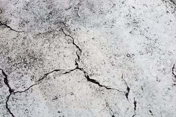 Fototapeta premium Abstract grunge texture of broken white painted cement floor.