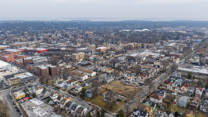 Obraz premium Foggy aerial drone photo of Mount Vernon New York with overcast winter sky and dense neighborhoods, image 5