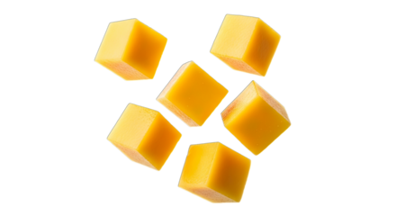 Deliciously vibrant mango cubes, perfectly diced and fresh, floating in mid-air