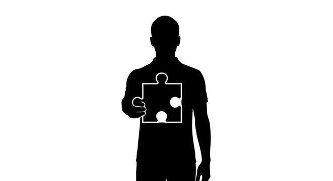 A silhouette of a man holding a puzzle piece in his hand on a white background representing problem solving and completion with concept - Powered by Adobe