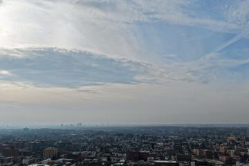 Fototapeta premium Foggy aerial drone photo of Mount Vernon New York with overcast winter sky and dense neighborhoods, image 20