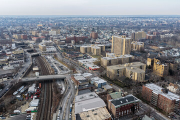 Obraz premium Foggy aerial drone photo of Mount Vernon New York with overcast winter sky and dense neighborhoods, image 22