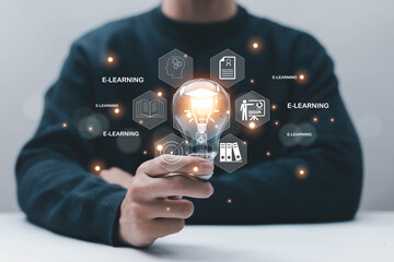 E-learning and digital education concept with glowing light bulb and graduation cap icon, representing online learning system, knowledge development, smart education, innovation, and future technology