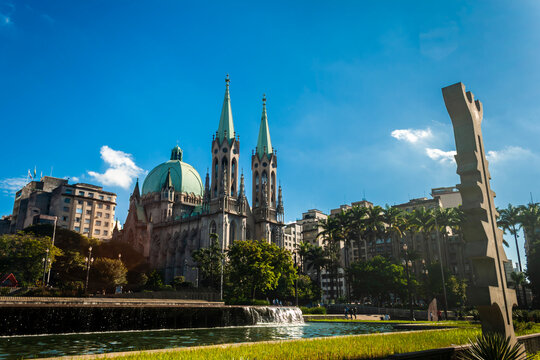 Sao Paulo, Brazil. May 16, 2012. The Marco Sincr&eacute;tico da Cultura Afro-Brasileira by Rubem Valentin, honoring Afro-Brazilian heritage, stands before the iconic S&eacute; Cathedral, symbolizing syncretism.