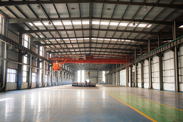 The clean and tidy environment in the steel mill workshop, with smooth and clean ceilings and floors