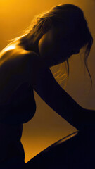 Silhouette Of A Woman In Warm Sunset Light, Creating Contemplative and Dramatic Mood