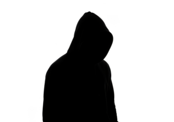 Silhouette of a hooded figure isolated on transparent background