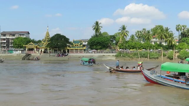 Traditional Burmese Boats on a Tributary of the Yangon and Bago Rivers in Myanmar