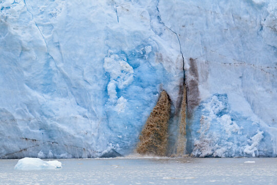 Meltwater flows from 14th of July Glacier in Svalbard Arctic landscape