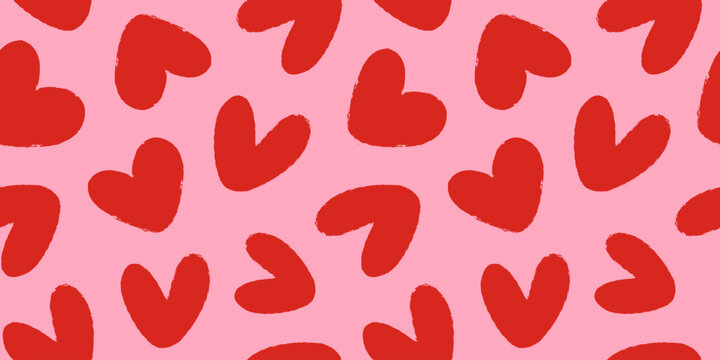 Seamless pattern of red hand drawn romantic hearts on a pink background. Design elements for Valentine's Day. Vector illustration