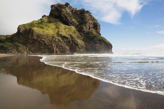 Lion Rock at Piha Beach along Tasman Sea Auckland District New Zealand