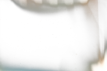 Retro film overlay effect with light leaks, retro grain, noisy film, distressed texture, light leak, copy space dark center