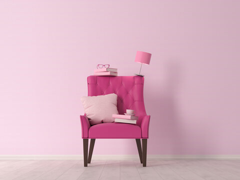 Pink armchair with books, lamp and pillow symbolizing balance and relaxation