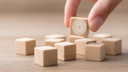 Strategic target setting with wooden blocks home office business concept minimalist environment close-up perspective