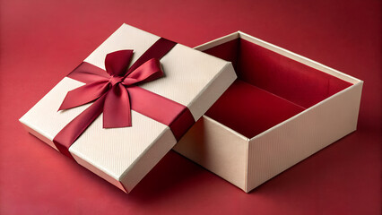 Open gift box with red ribbon