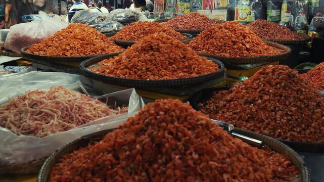 Mountains of traditional crispy dried shrimps in local market, Kep, Cambodia