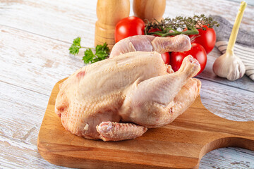 Raw whole uncooked organic chicken