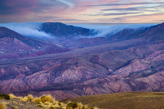 Colored mountains and cloudscape in Serran�a de Hornocal at sunset