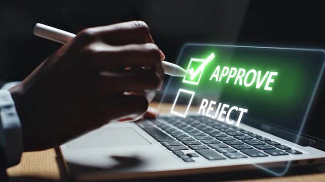 A person s hand uses a white pen to point towards an approve option on a glowing laptop screen displaying a choice