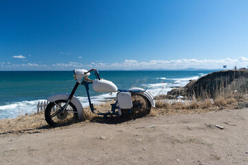Retro cross bike on the beach in Ravda resort in Bulgaria