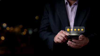Man holding a smartphone displaying a five star rating in a darkened cityscape