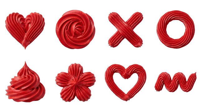 Red buttercream frosting set including hearts, roses, swirl, flower, and squiggle shapes isolated. Cake decorating and pastry design elements.