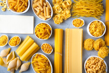 Composition with different tasty uncooked pasta - Italian pasta wallpaper, different types and shapes of pasta layout