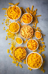 Composition with different tasty uncooked pasta - Italian pasta wallpaper, different types and shapes of pasta layout